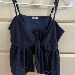 Dark blue garage tie in the front tank top